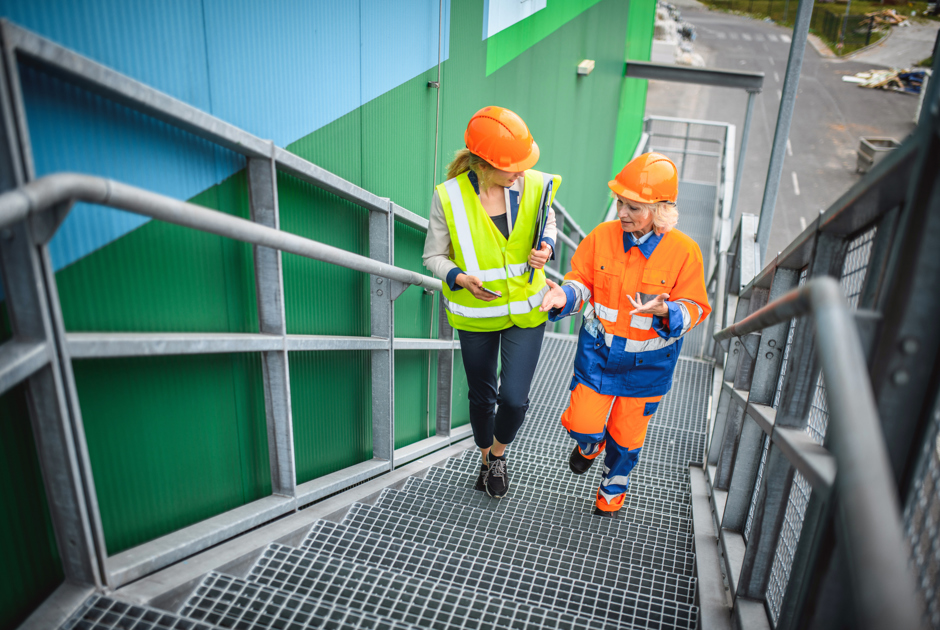 Recycling Workers Walking Up Steps