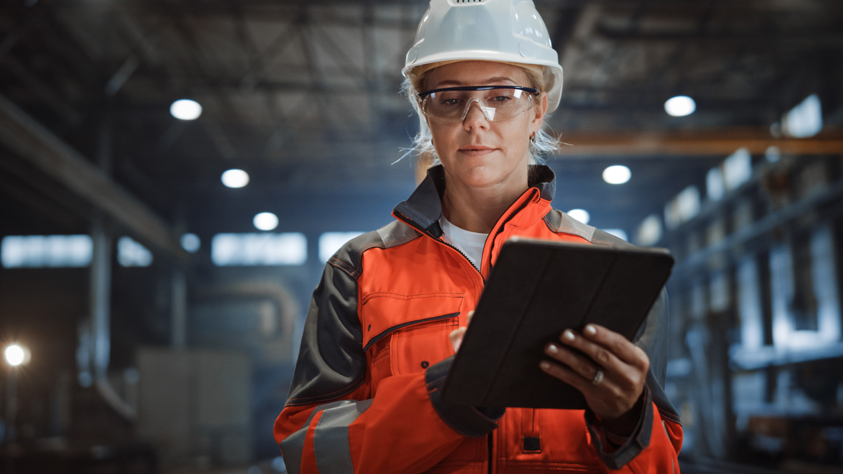 Manual Worker With Clipboard And Hardhat
